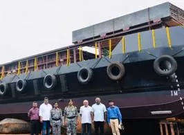 LAUNCH OF THIRD MCA BARGE, LSAM 9 (YARD 77)